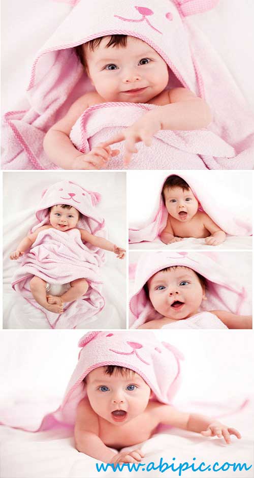 دانلود تصاویر استوک نوزاد در رختخواب صورتی Stock Photo baby in a pink bedspread