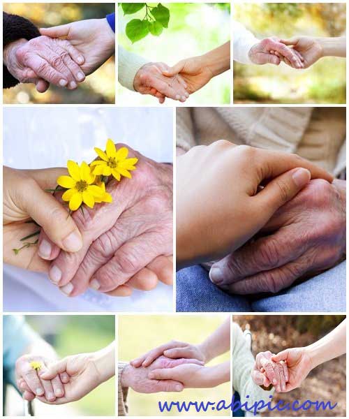 دانلود تصاویر استوک دست در دست سالمندان Holding hands with senior